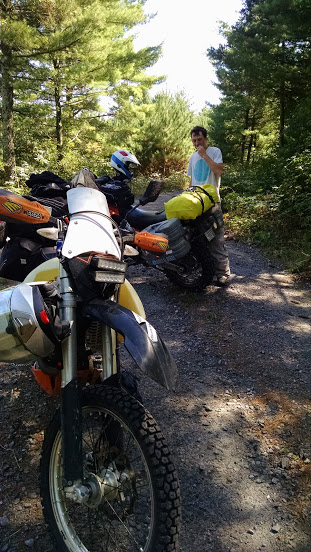 Illustration for article titled Don’t Be Late! 2 Singles and a Twin KTM Ride the TWAT Day 2